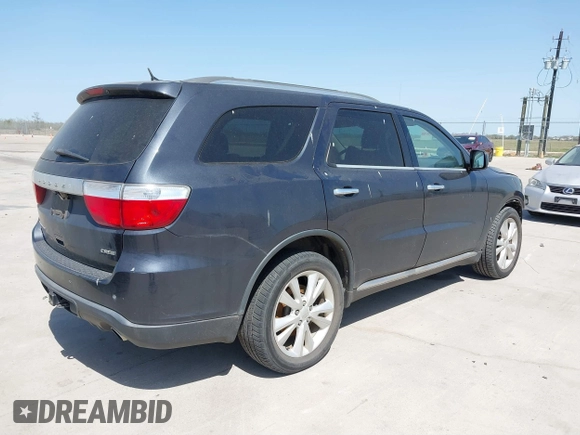 2013 Dodge Durango Crew with VIN 1C4SDHDT5DC637535, listed as a IAAI auction lot 41867982 with 162,569 mi miles and . Bid and sale history available at DreamBid. Image 4.