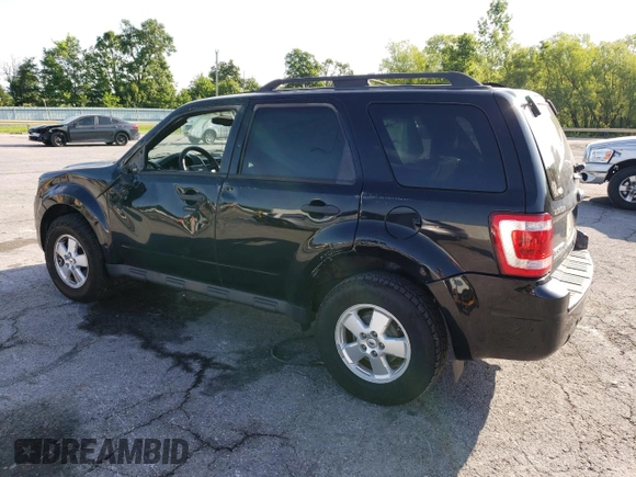 2012 Ford Escape XLT with VIN 1FMCU9DG5CKC54126, listed as a Copart auction lot 58063415 with 158,799 mi miles and Salvage title. Bid and sale history available at DreamBid. Image 2.