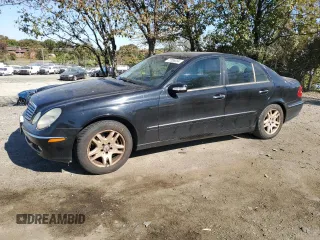2003 Mercedes-Benz E-Class 3.2L with VIN WDBUF65J03A281430, listed as a Copart auction lot 77086054 with 121,080 mi miles and Salvage Title. Bid and sale history available at carsss.com. Image 1.