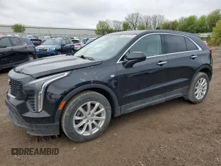 2019 Cadillac XT4 FWD Luxury z VIN 1GYAZAR43KF115563, wystawiony jako Copart lot #55072215 z przebiegiem 107 038 mil mil oraz Czysty tytuł • Clean title. Historia ofert i sprzedaży dostępna na DreamBid. Obrazek 1.