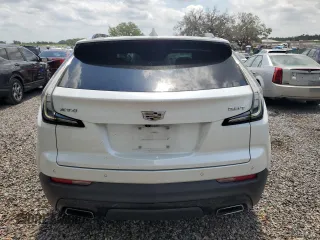 2019 Cadillac XT4 FWD Sport z VIN 1GYFZER47KF187301, wystawiony jako Copart lot #57715115 z przebiegiem 64 246 mil mil oraz Szkody całkowita. Historia ofert i sprzedaży dostępna na DreamBid. Obrazek 6.
