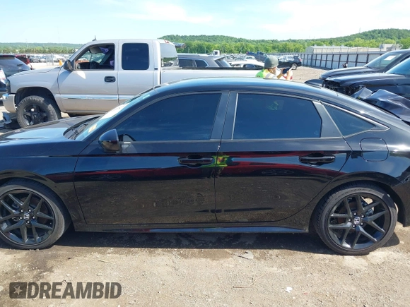 2023 Honda Civic Sport with VIN 2HGFE2F58PH557787, listed as a IAAI auction lot 42207827 with 51,885 mi miles and . Bid and sale history available at DreamBid. Image 14.