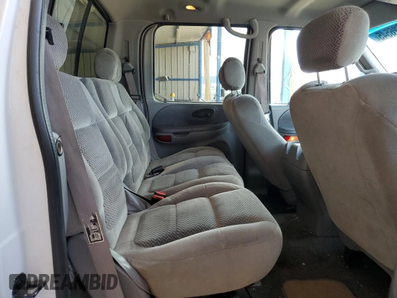 2001 Ford F-150 XLT with VIN 1FTRW08L41KB76026, listed as a Copart auction lot 63526545 with 174,126 mi miles and Clean title. Bid and sale history available at DreamBid. Image 10.