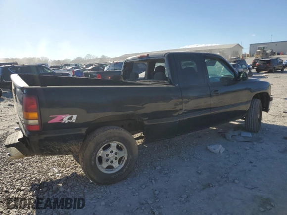 1999 Chevrolet Silverado 1500 LT with VIN 1GCEK19T9XE255438, listed as a Copart auction lot 50556165 with 185,557 mi miles and Salvage Title. Bid and sale history available at DreamBid. Image 3.
