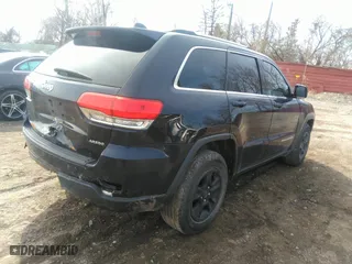 2014 Jeep Grand Cherokee Laredo with VIN 1C4RJEAG3EC393866, listed as a IAAI auction lot 41863877 with 134,977 mi miles. Bid and sale history available at carsss.com. Image 4.
