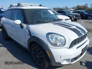 2014 MINI Countryman S z VIN WMWZC5C5XEWM18313, wystawiony jako IAAI lot #42106902 z przebiegiem 91 662 mil mil oraz . Historia ofert i sprzedaży dostępna na DreamBid. Obrazek 1.