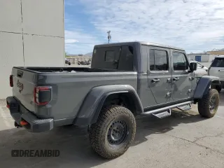2023 Jeep Gladiator Mojave z VIN 1C6JJTEG7PL548084, wystawiony jako Copart lot #52827265 z przebiegiem 26 789 mil mil oraz Czysty tytuł • Clean title. Historia ofert i sprzedaży dostępna na DreamBid. Obrazek 3.