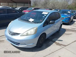 2009 Honda Fit with VIN JHMGE88289S004009, listed as a IAAI auction lot 41803838 with 194,304 mi miles. Bid and sale history available at carsss.com. Image 2.