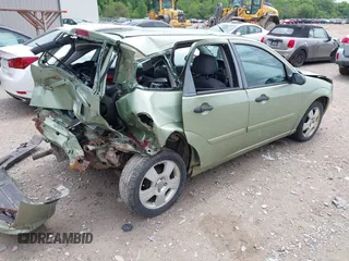 2007 Ford Focus S z VIN 1FAHP37N47W278284, wystawiony jako IAAI lot #42246383 z przebiegiem 164 830 mil mil oraz . Historia ofert i sprzedaży dostępna na DreamBid. Obrazek 4.