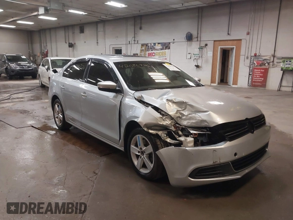 2014 Volkswagen Jetta TDI w/Premium with VIN 3VW3L7AJ6EM379401, listed as a IAAI auction lot 42086326 with 89,870 mi miles and . Bid and sale history available at DreamBid. Image 1.