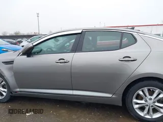 2013 Kia Optima EX z VIN 5XXGN4A72DG166687, wystawiony jako IAAI lot #41967631 z przebiegiem 202 712 mil mil oraz . Historia ofert i sprzedaży dostępna na DreamBid. Obrazek 15.