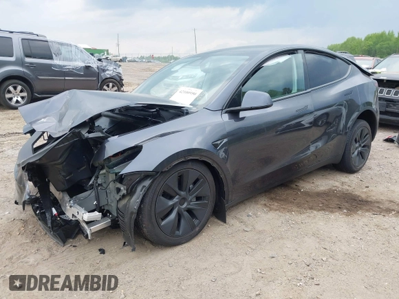 2025 Tesla Model Y Long Range with VIN 7SAYGDED7SA373235, listed as a IAAI auction lot 42100950 with 650 mi miles and . Bid and sale history available at DreamBid. Image 18.