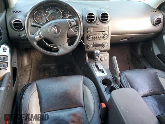 2008 Pontiac G6 GXP with VIN 1G2ZM577084181587, listed as a Copart auction lot 82910964 with 54,630 mi miles and Salvage Title. Bid and sale history available at DreamBid. Image 8.