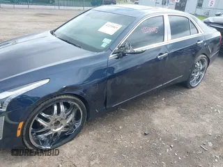 2015 Cadillac CTS Luxury AWD with VIN 1G6AX5SX5F0119102, listed as a IAAI auction lot 42231015 with 106,643 mi miles and . Bid and sale history available at DreamBid. Image 6.