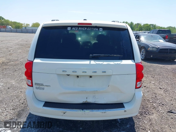 2012 Dodge Grand Caravan SXT with VIN 2C4RDGCG9CR200432, listed as a IAAI auction lot 42027477 with 99,076 mi miles and . Bid and sale history available at DreamBid. Image 16.