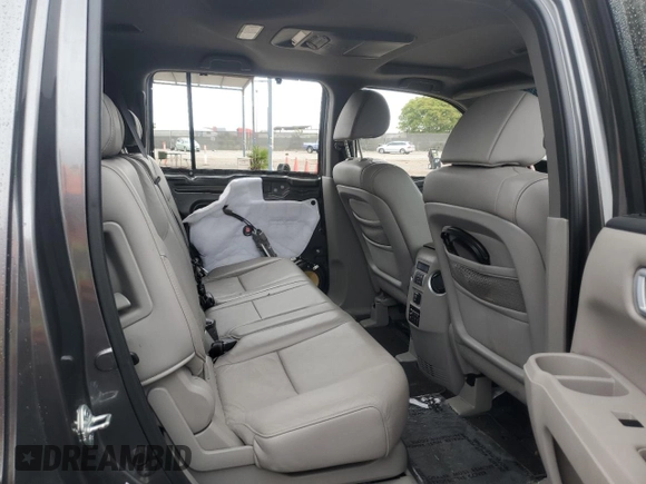 2011 Honda Pilot Touring z VIN 5FNYF4H94BB046303, wystawiony jako Copart lot #58017515 z przebiegiem 118 384 mil mil oraz Szkoda całkowita • Salvage title. Historia ofert i sprzedaży dostępna na DreamBid. Obrazek 11.