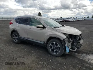 2018 Honda CR-V Touring with VIN 5J6RW2H98JL002657, listed as a Copart auction lot 55075965 with 61,327 mi miles and Salvage Title. Bid and sale history available at DreamBid. Image 4.