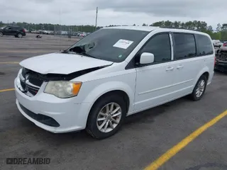2014 Dodge Grand Caravan SXT with VIN 2C4RDGCG0ER390849, listed as a IAAI auction lot 41957368 with 98,044 mi miles. Bid and sale history available at carsss.com. Image 2.