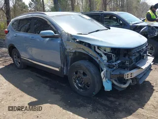 2020 Honda CR-V Touring with VIN 2HKRW2H95LH609144, listed as a IAAI auction lot 41982411 with 36,374 mi miles and . Bid and sale history available at DreamBid. Image 13.