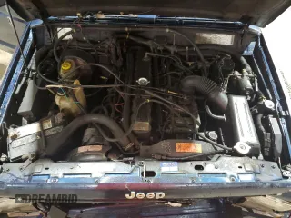 1995 Jeep Cherokee z VIN 1J4FN78S7SL537213, wystawiony jako Copart lot #58700105 z przebiegiem 261 606 mil mil oraz Szkoda całkowita • Salvage title. Historia ofert i sprzedaży dostępna na DreamBid. Obrazek 11.