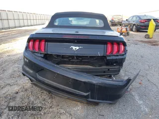 2021 Ford Mustang EcoBoost with VIN 1FATP8UH6M5103235, listed as a IAAI auction lot 40711543 with 52,470 mi miles. Bid and sale history available at carsss.com. Image 16.