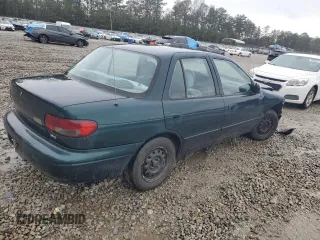 1996 Kia Sephia RS z VIN KNAFA1256T5265533, wystawiony jako Copart lot #48195555 z przebiegiem 225 062 mil mil oraz Szkody całkowita. Historia ofert i sprzedaży dostępna na DreamBid. Obrazek 3.