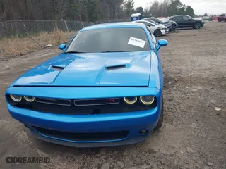 2015 Dodge Challenger R/T with VIN 2C3CDZAT6FH878216, listed as a IAAI auction lot 41304913 with 104,176 mi miles. Bid and sale history available at carsss.com. Image 12.