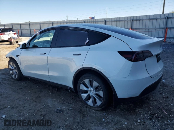 2023 Tesla Model Y Long Range z VIN 7SAYGAEE1PF810888, wystawiony jako Copart lot #88991735 z przebiegiem Nie podano mil oraz Nie do naprawy • Non repairable. Historia ofert i sprzedaży dostępna na DreamBid. Obrazek 2.