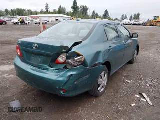 2010 Toyota Corolla with VIN 1NXBU4EE3AZ165944, listed as a IAAI auction lot 42597459 with 211,824 mi miles and . Bid and sale history available at DreamBid. Image 4.
