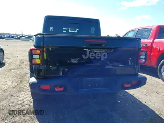 2021 Jeep Gladiator Mojave with VIN 1C6JJTEG9ML528964, listed as a IAAI auction lot 41879113 with 74,315 mi miles and . Bid and sale history available at DreamBid. Image 16.