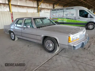 1990 Ford Crown Victoria z VIN 2FACP73F9LX166174, wystawiony jako Copart lot #76043234 z przebiegiem 52 545 mil mil oraz Szkoda całkowita • Salvage title. Historia ofert i sprzedaży dostępna na DreamBid. Obrazek 4.