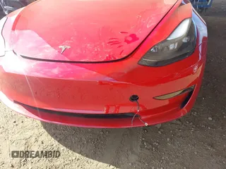 2023 Tesla Model 3 with VIN 5YJ3E1EA9PF546264, listed as a IAAI auction lot 41657055 with 5,634 mi miles and . Bid and sale history available at DreamBid. Image 6.