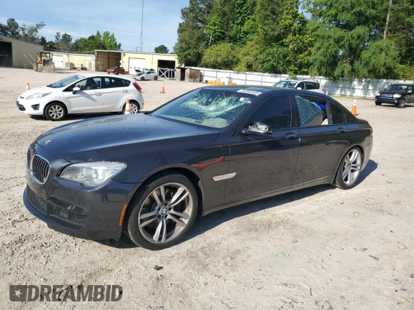 2013 BMW 7 Series 750Li xDrive with VIN WBAYF8C57DD140694, listed as a Copart auction lot 56983435 with 113,444 mi miles and Salvage title. Bid and sale history available at DreamBid. Image 1.