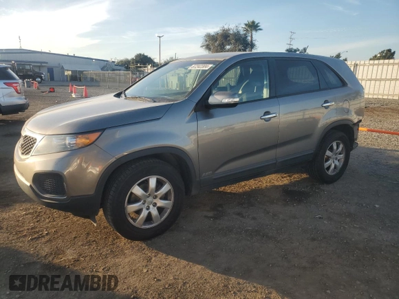 2012 Kia Sorento LX with VIN 5XYKTCA62CG255185, listed as a Copart auction lot 87242304 with 124,224 mi miles and Salvage Title. Bid and sale history available at DreamBid. Image 1.