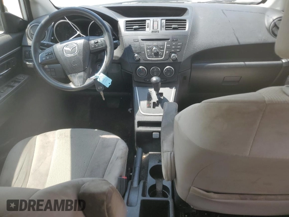 2014 Mazda 5 Sport with VIN JM1CW2BL7E0173729, listed as a Copart auction lot 68676554 with 102,734 mi miles and Salvage Title. Bid and sale history available at DreamBid. Image 8.