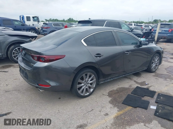 2021 Mazda 3 Preferred with VIN 3MZBPACL6MM252531, listed as a IAAI auction lot 42145811 with 35,869 mi miles and . Bid and sale history available at DreamBid. Image 4.