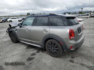 2018 MINI Countryman Cooper S E with VIN WMZYU7C47J3E56482, listed as a Copart auction lot 48877985 with 60,829 mi miles and Salvage Title. Bid and sale history available at carsss.com. Image 2.
