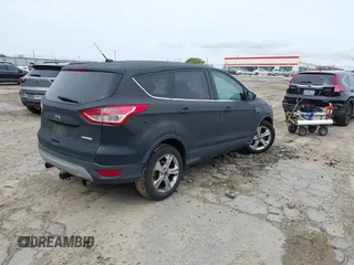 2013 Ford Escape SE with VIN 1FMCU0GX1DUD14948, listed as a IAAI auction lot 41876628 with 277,194 mi miles and . Bid and sale history available at DreamBid. Image 4.