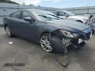 2014 Mazda Mazda6 i Touring with VIN JM1GJ1T51E1106029, listed as a Copart auction lot 57325764 with 169,788 mi miles and Clean Title. Bid and sale history available at carsss.com. Image 4.