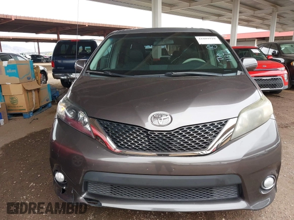 2011 Toyota Sienna SE with VIN 5TDXK3DC6BS113711, listed as a IAAI auction lot 41809910 with 174,746 mi miles. Bid and sale history available at carsss.com. Image 6.