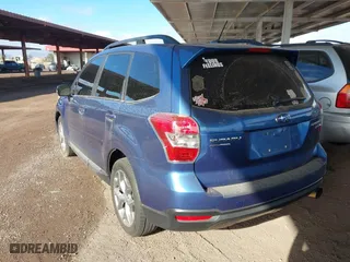 2015 Subaru Forester 2.5i Touring with VIN JF2SJAWC0FH485216, listed as a IAAI auction lot 41744706 with 61,683 mi miles. Bid and sale history available at carsss.com. Image 3.