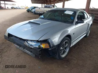 2001 Ford Mustang GT Deluxe z VIN 1FAFP42X11F210649, wystawiony jako IAAI lot #42052467 z przebiegiem 140 675 mil mil oraz . Historia ofert i sprzedaży dostępna na DreamBid. Obrazek 18.