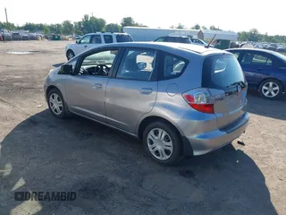 2009 Honda Fit z VIN JHMGE88289C002965, wystawiony jako IAAI lot #42382336 z przebiegiem 120 727 mil mil oraz . Historia ofert i sprzedaży dostępna na DreamBid. Obrazek 3.