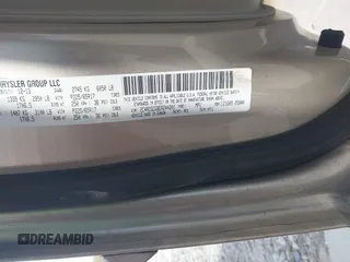 2014 Dodge Grand Caravan SXT with VIN 2C4RDGCG8ER244201, listed as a IAAI auction lot 42017091 with 161,653 mi miles and . Bid and sale history available at DreamBid. Image 9.