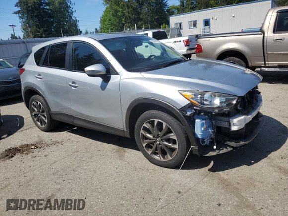 2016 Mazda CX-5 Grand Touring with VIN JM3KE4DY2G0764130, listed as a Copart auction lot 55350145 with 85,503 mi miles and Salvage Title. Bid and sale history available at carsss.com. Image 4.