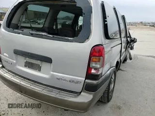 2004 Chevrolet Venture LS z VIN 1GNDX03E44D179265, wystawiony jako Copart lot #82254644 z przebiegiem Nie podano mil oraz Szkody całkowita. Historia ofert i sprzedaży dostępna na DreamBid. Obrazek 12.