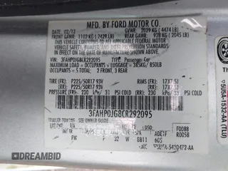 2012 Ford Fusion SEL with VIN 3FAHP0JG8CR292095, listed as a IAAI auction lot 41710438 with 140,363 mi miles. Bid and sale history available at carsss.com. Image 9.