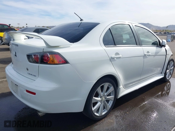 2013 Mitsubishi Lancer GT with VIN JA32U8FW7DU011260, listed as a IAAI auction lot 41233707 with 165,183 mi miles. Bid and sale history available at carsss.com. Image 4.