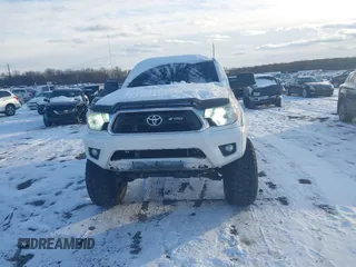 2014 Toyota Tacoma with VIN 3TMLU4EN0EM147193, listed as a IAAI auction lot 41280636 with 162,345 mi miles. Bid and sale history available at carsss.com. Image 12.