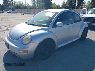 2005 Volkswagen Beetle GL with VIN 3VWBK31C95M403330, listed as a IAAI auction lot 42134616 with 152,736 mi miles and . Bid and sale history available at DreamBid. Image 2.